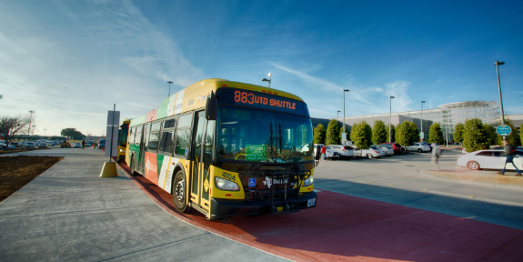 Student Organization Spotlight: CFBT. A Comet Cruiser bus parked at the UT Dallas transit center.