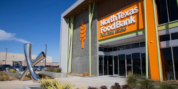Eco Hub Becomes a NTFB Partner Garden. The front of a North Texas Food Bank warehouse.