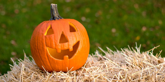 Dispose of Your Pumpkins and Candy Wrappers Sustainably. A carved halloween pumpkin.