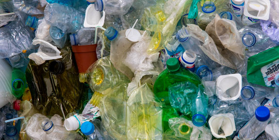Single-Use Plastics Town Hall Recap. A collection of plastic waste.