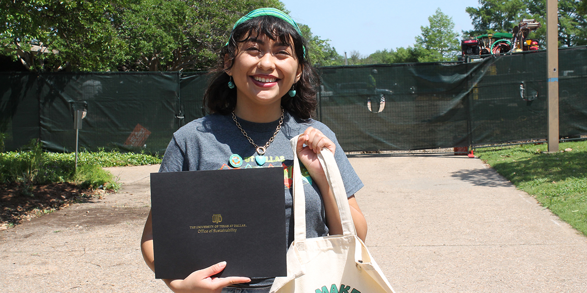 Receiving the Sustainability Honors award and regalia at the Spring Awards Ceremony.